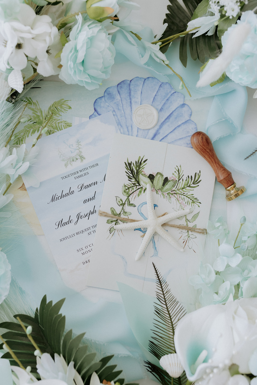 Coastal wedding invitation flatlay
